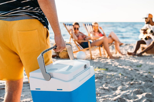 Man holding a portable cooler